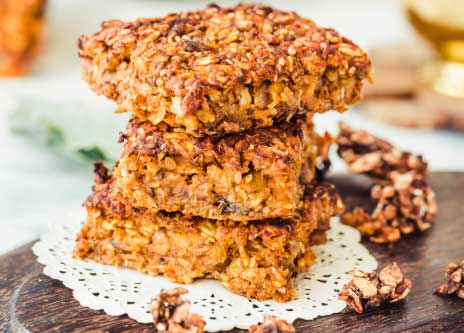 These energy bars are great for using up any nuts or dried fruit you have in the back of your cupboard; desiccated coconut, chocolate chips, or anything else you fancy!